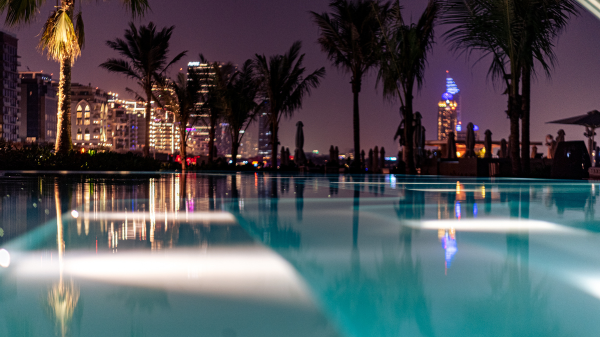 Experience The Club's Unique Night Swim This Summer: Float the Evening Away