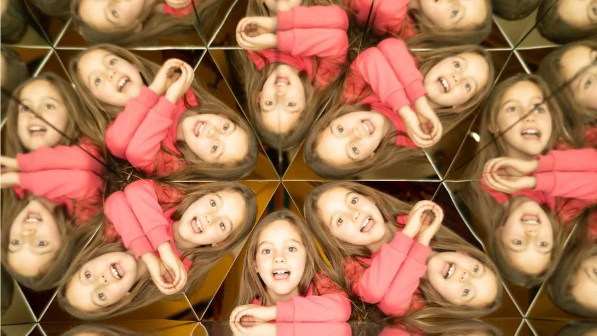 Child inside a tilted illusion room at Museum of Illusions Dubai