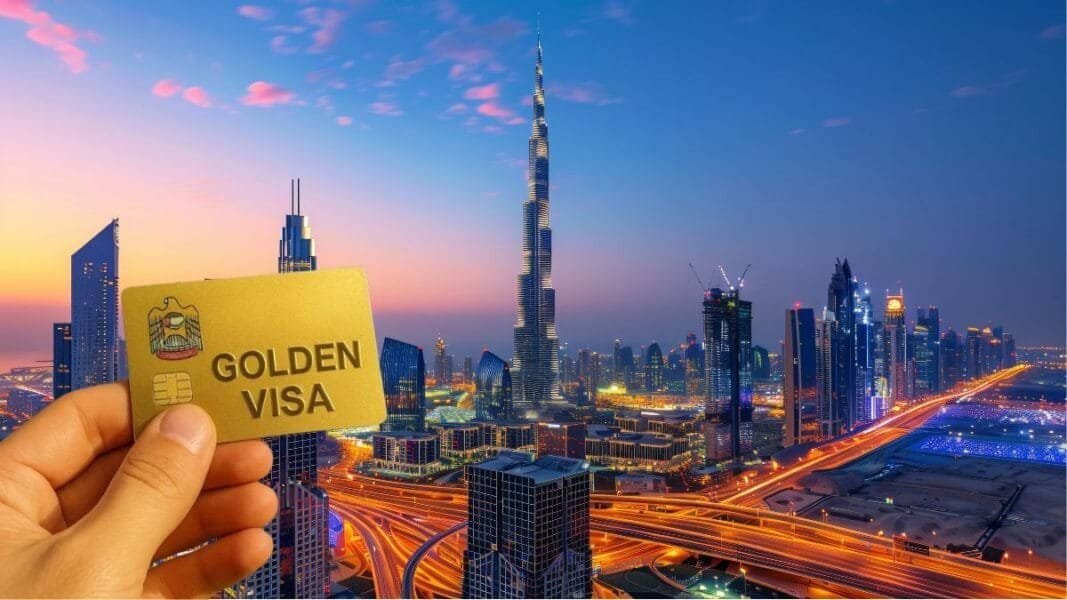 UAE Golden Visa residence card held up against a Dubai skyline backdrop